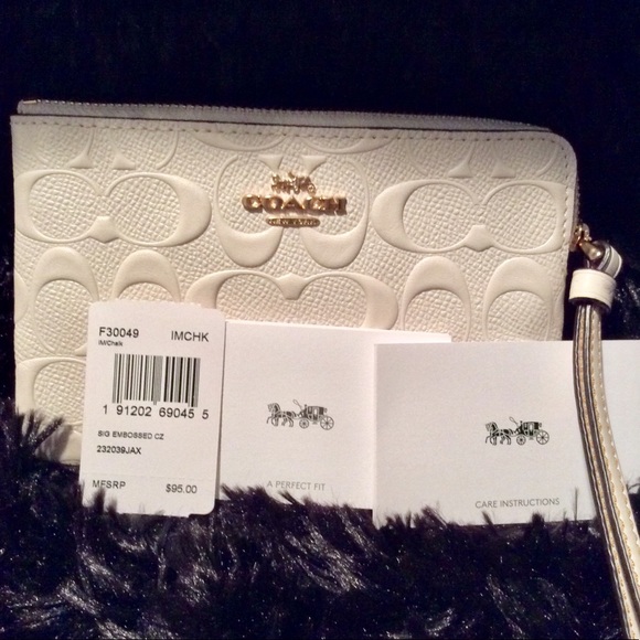 Coach Handbags - NWT COACH Signature embossed wristlet